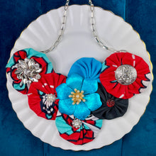 Load image into Gallery viewer, Red &amp; Blue Kenyan Fabric Flower Bomb with Turquoise Vintage Flower
