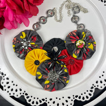 Load image into Gallery viewer, Grey &amp; Yellow Flower Bomb with Red &amp; Black Flower Pin
