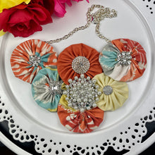 Load image into Gallery viewer, Turquoise &amp; Orange Fabric Flower Bomb with Vintage Pearl Pin
