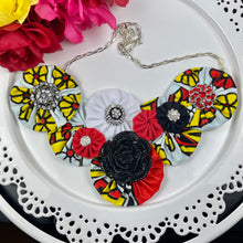 Load image into Gallery viewer, White, Yellow &amp; Red Kenya Fabric Flower Bomb with Black Button
